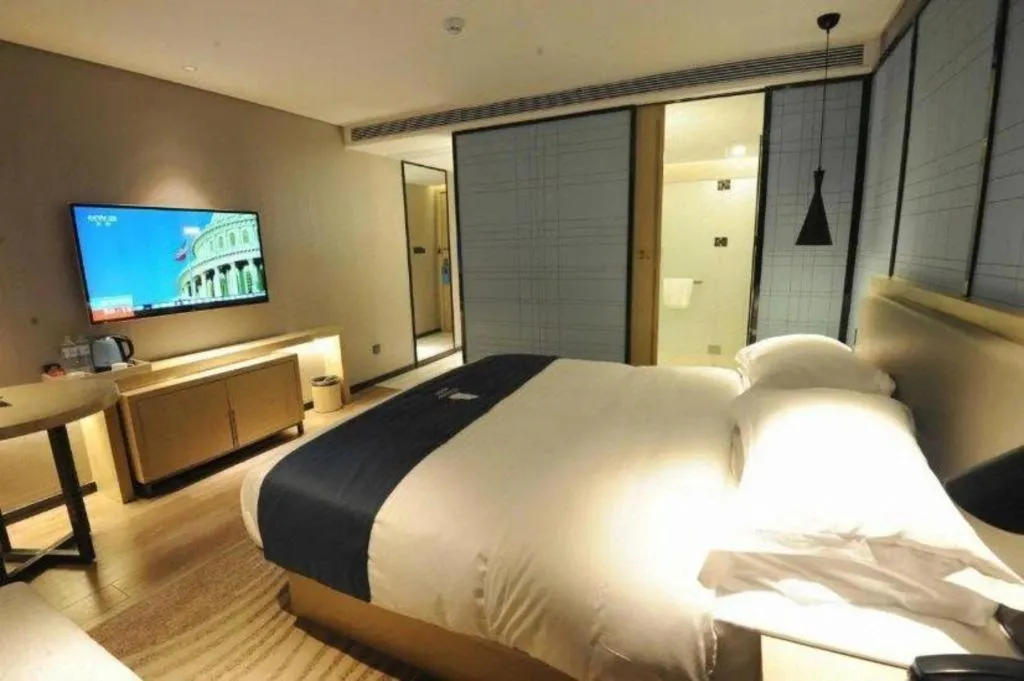Bed in Echarm Hotel Nanning Qingxiu Mountain