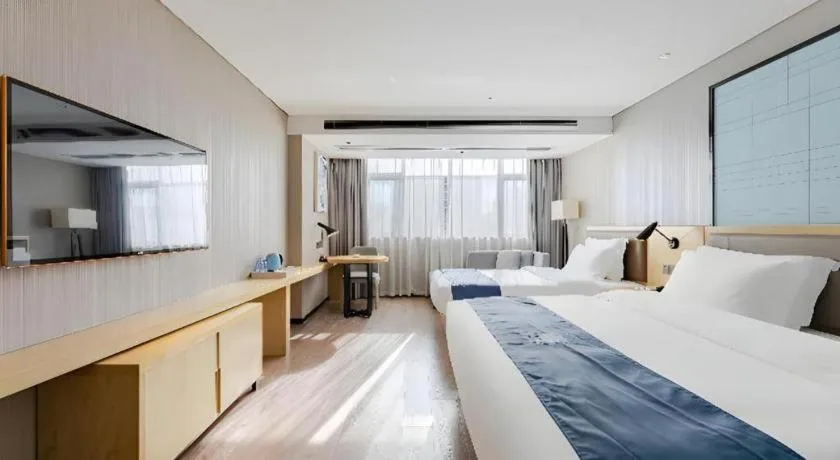 Bed in Echarm Hotel Nanning Qingxiu Mountain