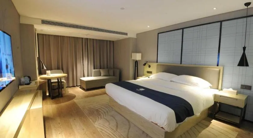 Bed in Echarm Hotel Nanning Qingxiu Mountain