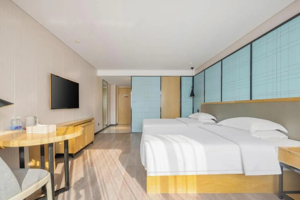 Bed in Echarm Hotel Nanning Qingxiu Mountain