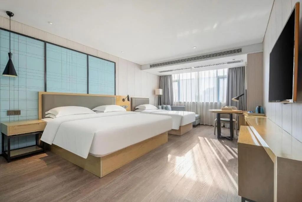 Bed in Echarm Hotel Nanning Qingxiu Mountain