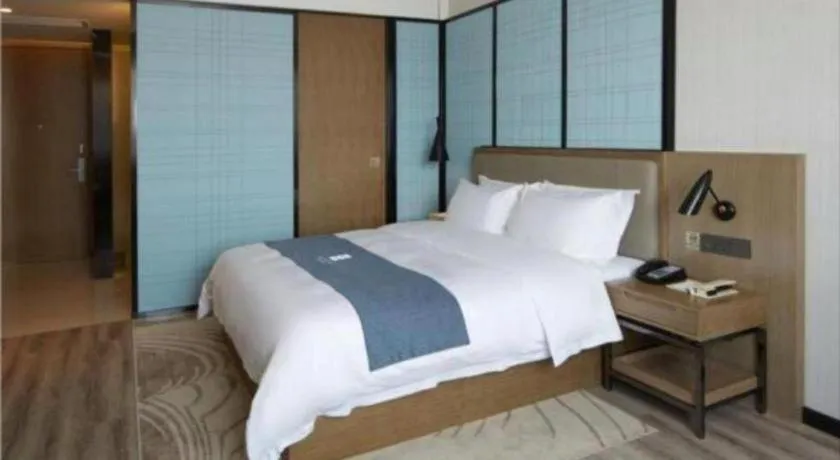 Bed in Echarm Hotel Nanning Qingxiu Mountain