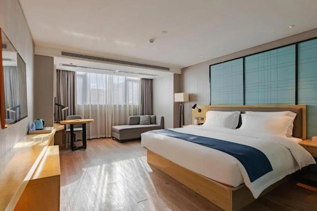 Bed in Echarm Hotel Nanning Qingxiu Mountain