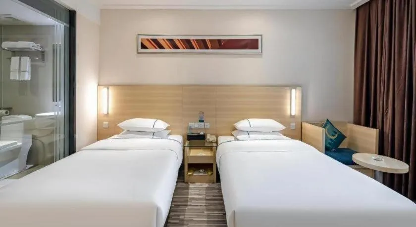 Bed in City Comfort Inn Guangzhou Renhe Metro Station Huatong Plaza
