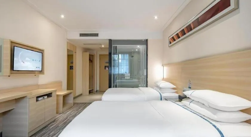 Bed in City Comfort Inn Guangzhou Renhe Metro Station Huatong Plaza
