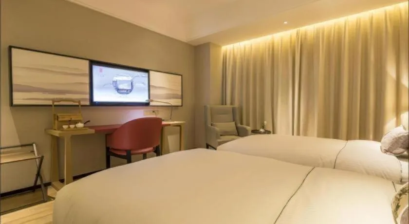 Bed in Echeng Hotel Nanning Jiangnan Wanda Baisha Avenue