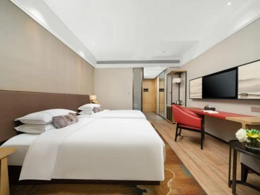 Bed in Echeng Hotel Nanning Jiangnan Wanda Baisha Avenue