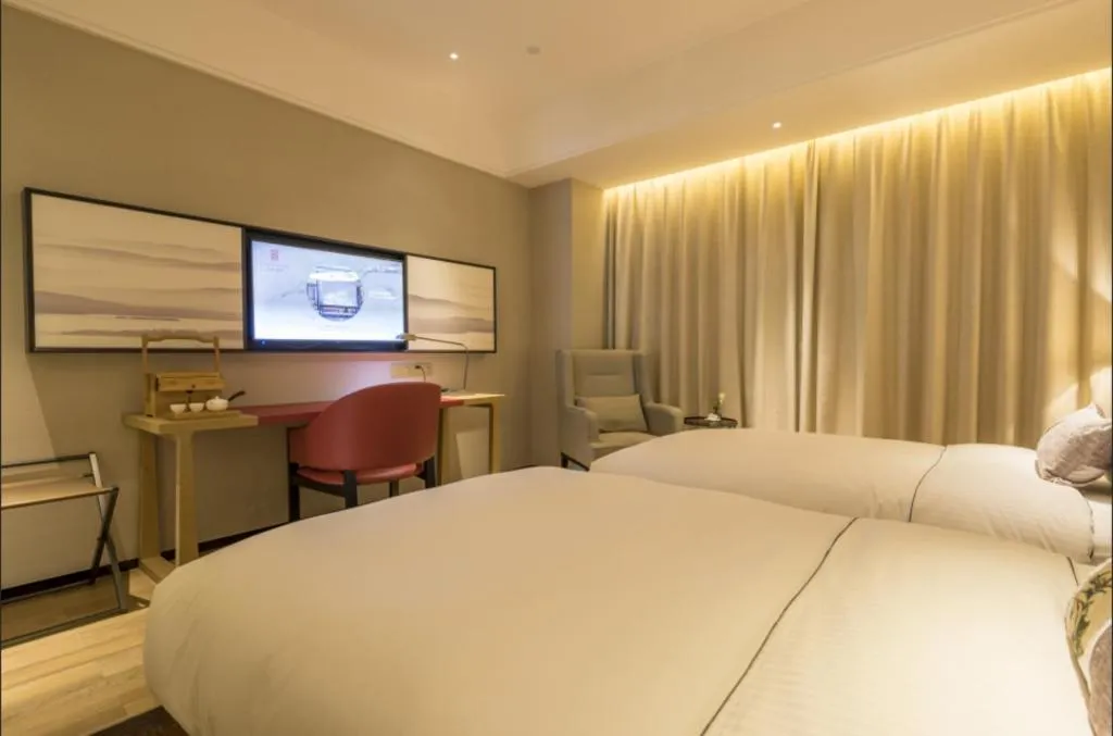 Bed in Echeng Hotel Nanning Jiangnan Wanda Baisha Avenue
