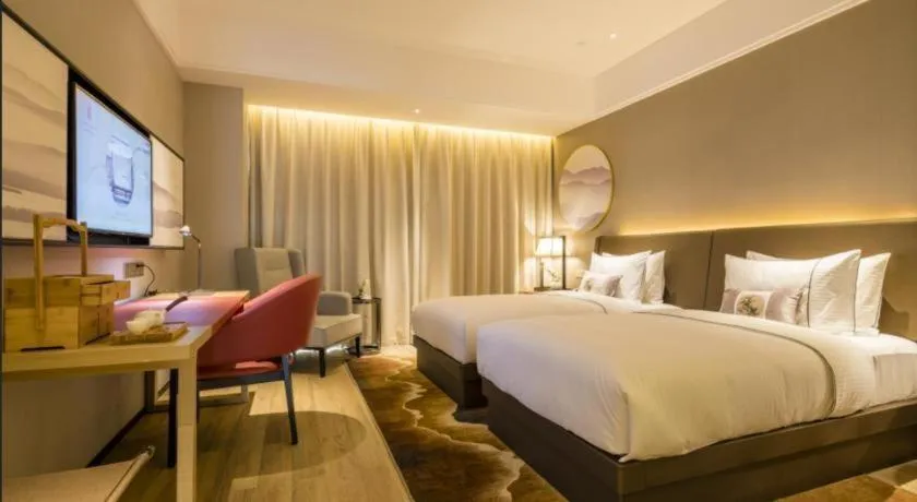 Bed in Echeng Hotel Nanning Jiangnan Wanda Baisha Avenue