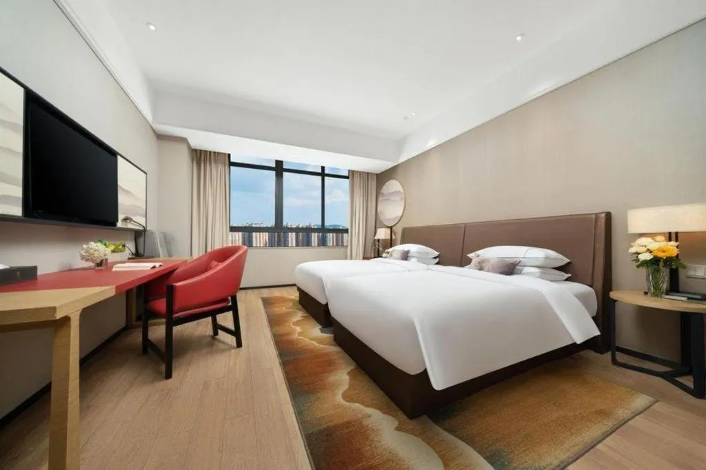 Bed in Echeng Hotel Nanning Jiangnan Wanda Baisha Avenue