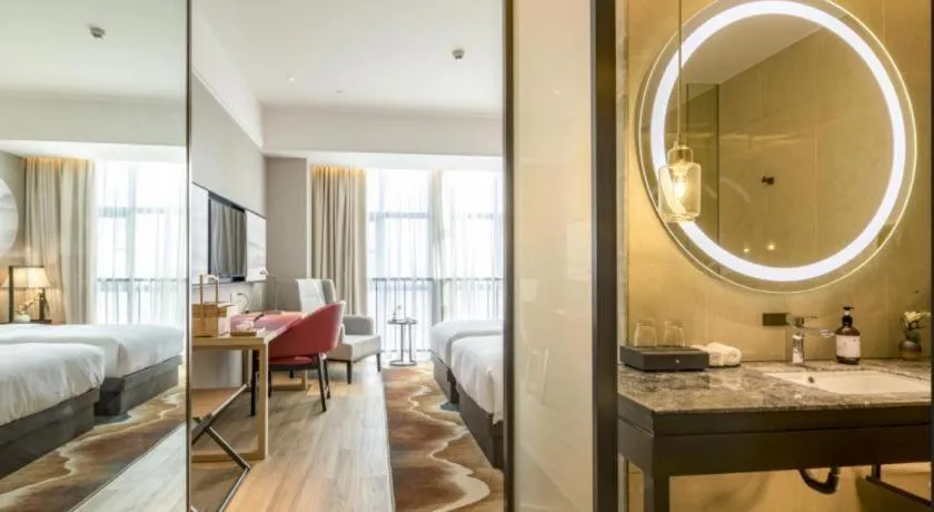 Bed in Echeng Hotel Nanning Jiangnan Wanda Baisha Avenue