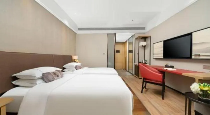 Bed in Echeng Hotel Nanning Jiangnan Wanda Baisha Avenue