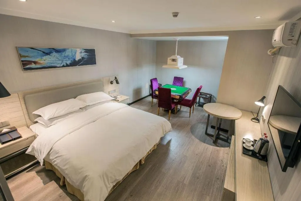 Bed in Borrman Hotel Wuhan Yangluo Metro Station Shenshuigang