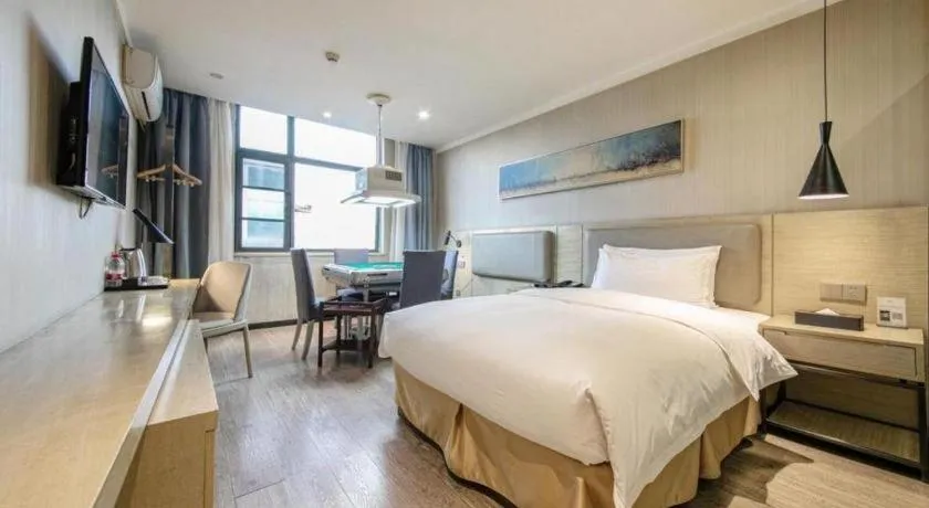 Bed in Borrman Hotel Wuhan Yangluo Metro Station Shenshuigang