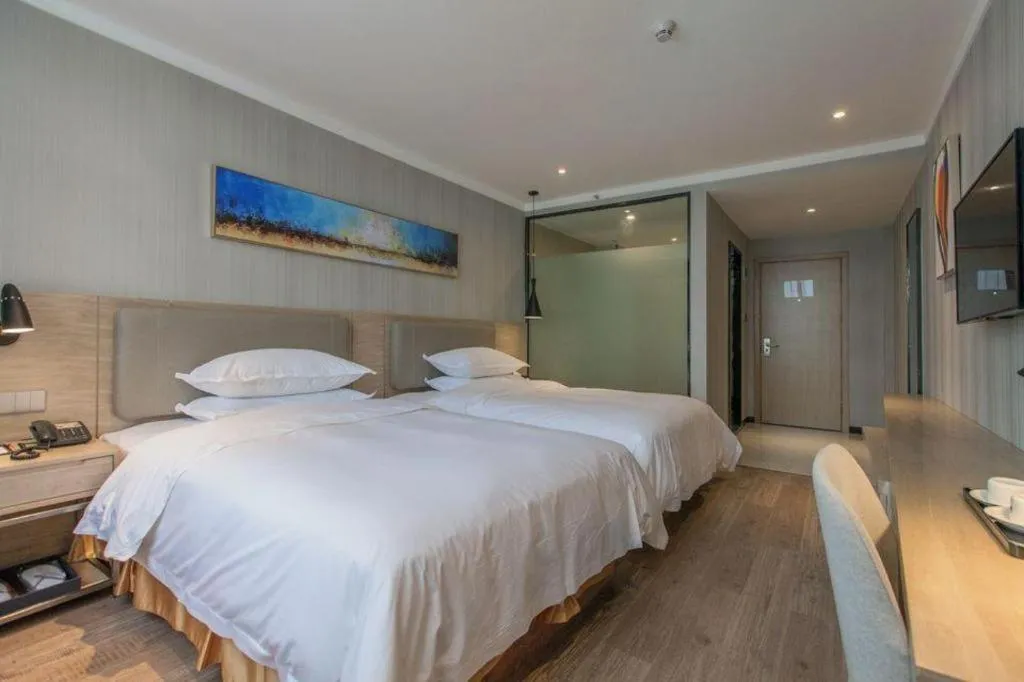 Bed in Borrman Hotel Wuhan Yangluo Metro Station Shenshuigang