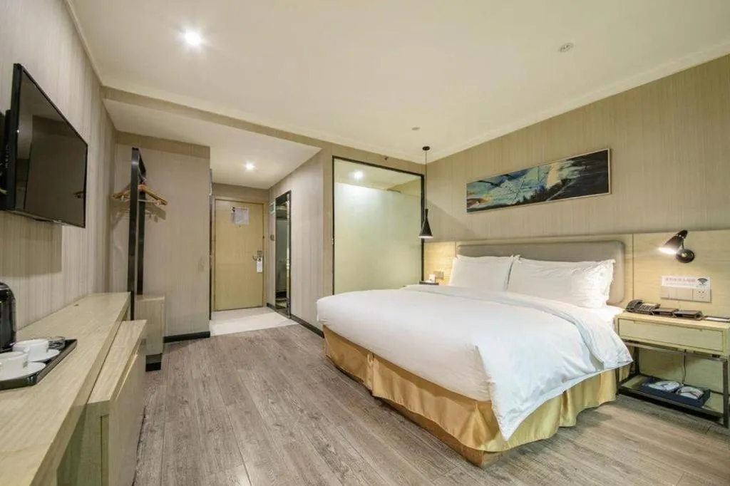 Bed in Borrman Hotel Wuhan Yangluo Metro Station Shenshuigang