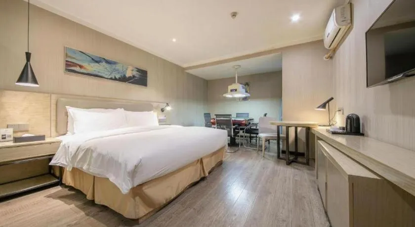 Bed in Borrman Hotel Wuhan Yangluo Metro Station Shenshuigang