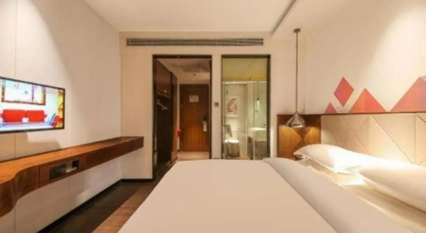 Bed in Borrman Hotel Zhongxiang Railway Station Mochou Village