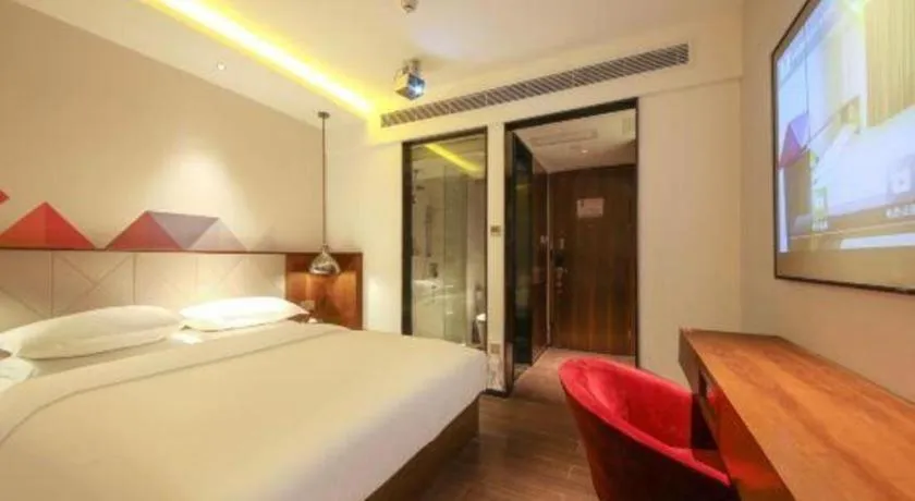 Bed in Borrman Hotel Zhongxiang Railway Station Mochou Village