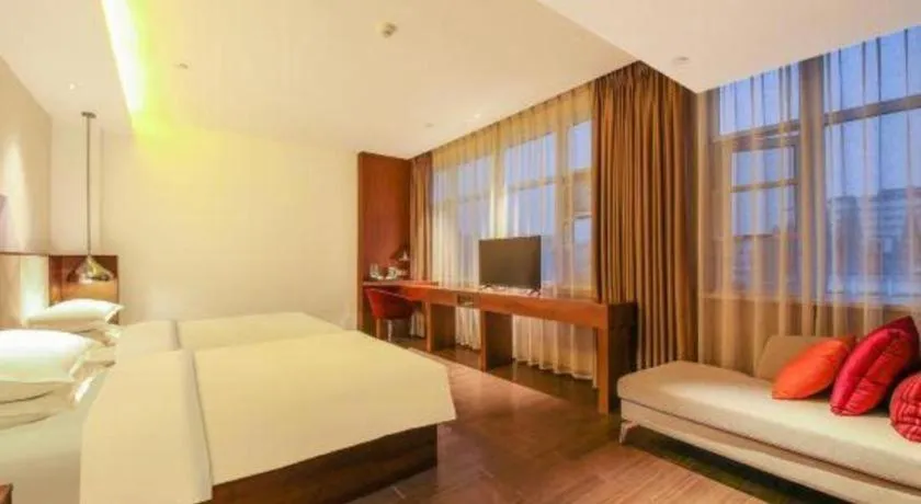 Bed in Borrman Hotel Zhongxiang Railway Station Mochou Village