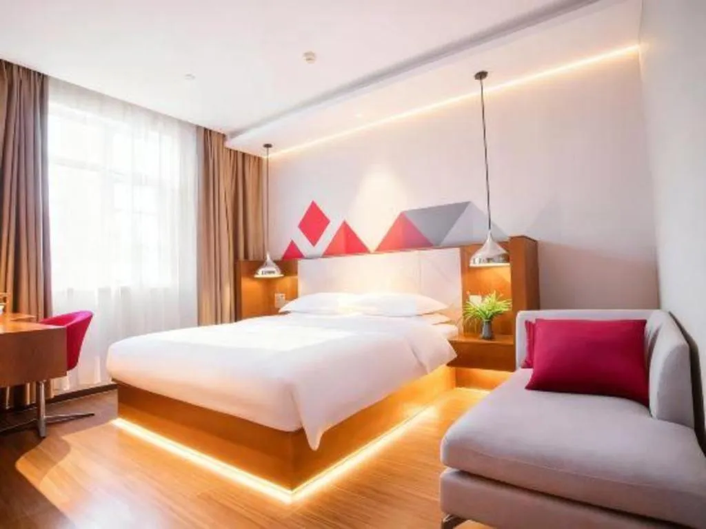 Bed in Borrman Hotel Zhongxiang Railway Station Mochou Village