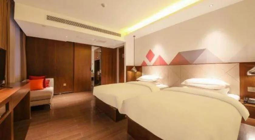 Bed in Borrman Hotel Zhongxiang Railway Station Mochou Village