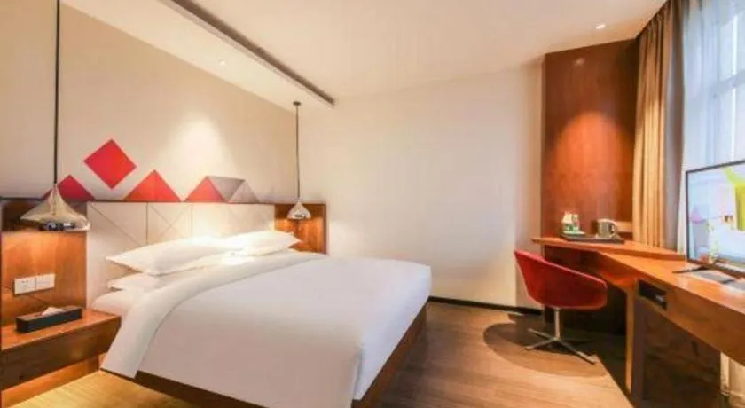 Bed in Borrman Hotel Zhongxiang Railway Station Mochou Village