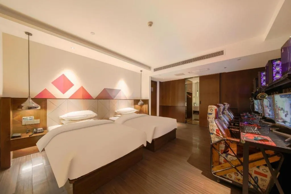 Bed in Borrman Hotel Zhongxiang Railway Station Mochou Village