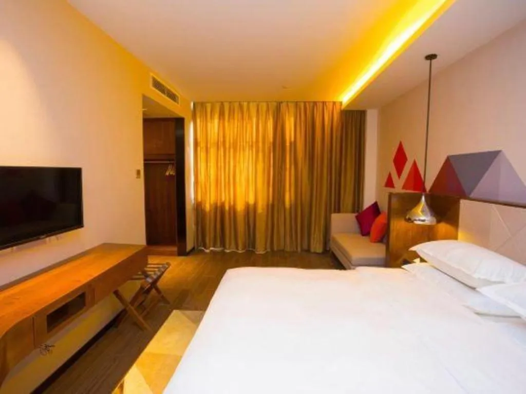 Bed in Borrman Hotel Zhongxiang Railway Station Mochou Village