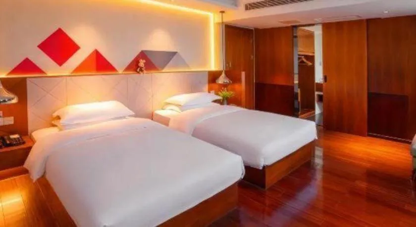 Bed in Borrman Hotel Zhongxiang Railway Station Mochou Village