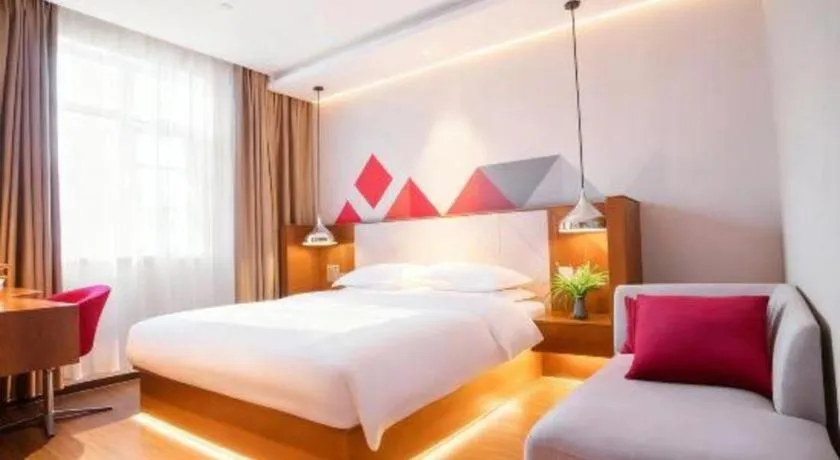 Bed in Borrman Hotel Zhongxiang Railway Station Mochou Village