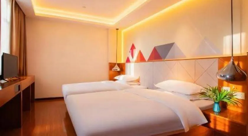 Bed in Borrman Hotel Zhongxiang Railway Station Mochou Village