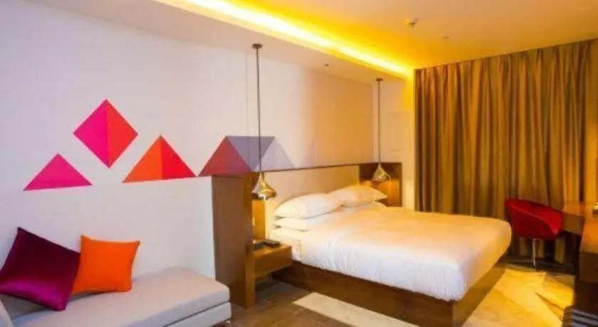 Bed in Borrman Hotel Zhongxiang Railway Station Mochou Village