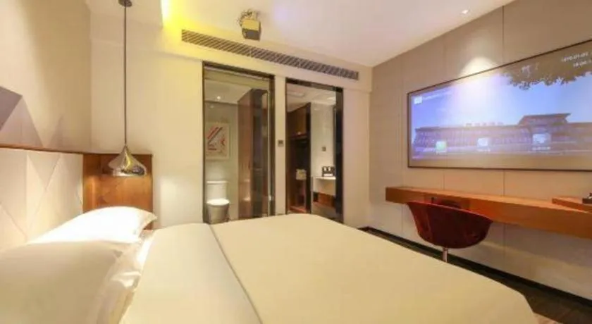 Bed in Borrman Hotel Zhongxiang Railway Station Mochou Village