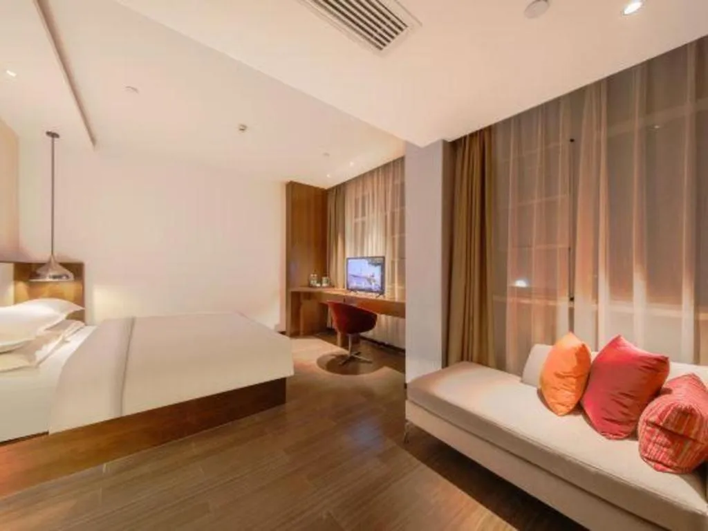 Bed in Borrman Hotel Zhongxiang Railway Station Mochou Village