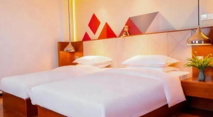 Bed in Borrman Hotel Zhongxiang Railway Station Mochou Village