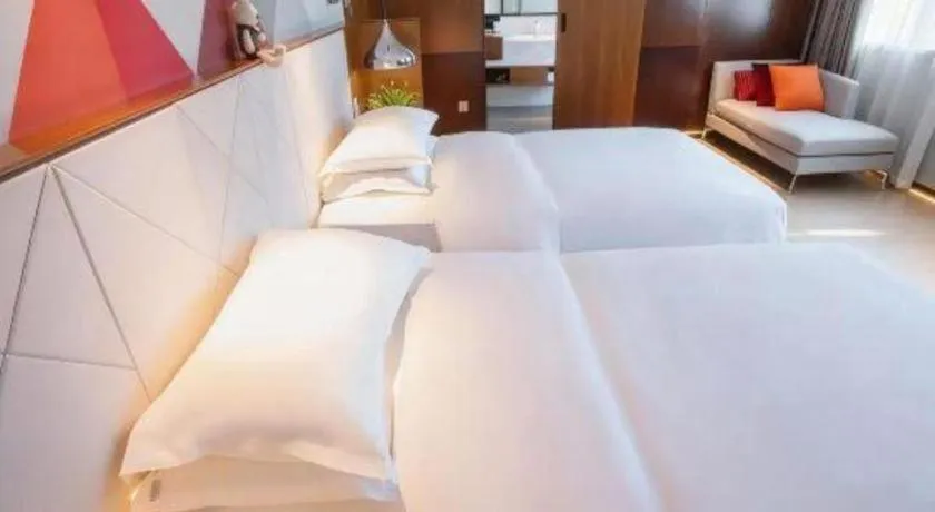 Bed in Borrman Hotel Zhongxiang Railway Station Mochou Village