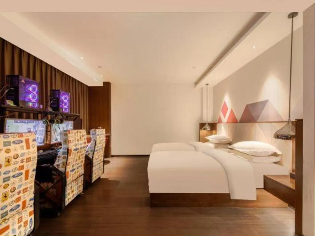 Bed in Borrman Hotel Zhongxiang Railway Station Mochou Village