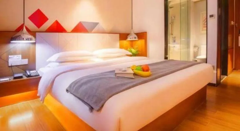 Bed in Borrman Hotel Zhongxiang Railway Station Mochou Village