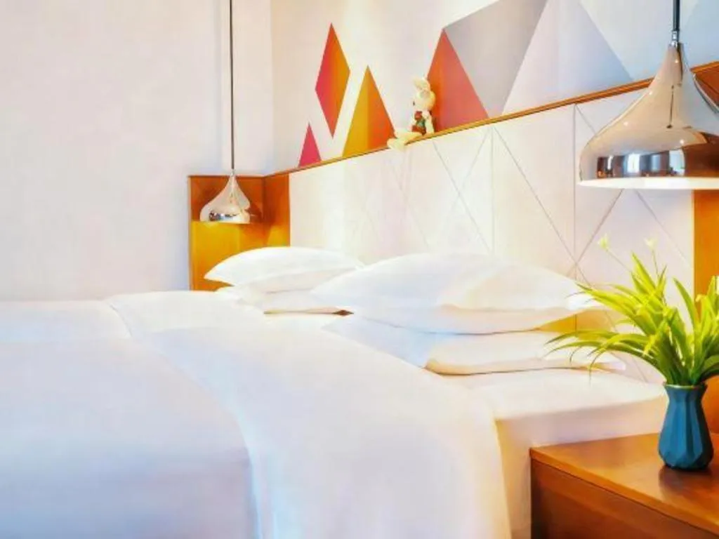 Bed in Borrman Hotel Zhongxiang Railway Station Mochou Village