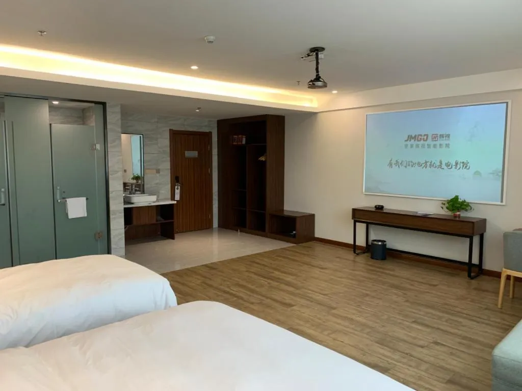 Bed in Borrman Hotel East Huai'an Railway Station Zhou 'Enlai Memorial