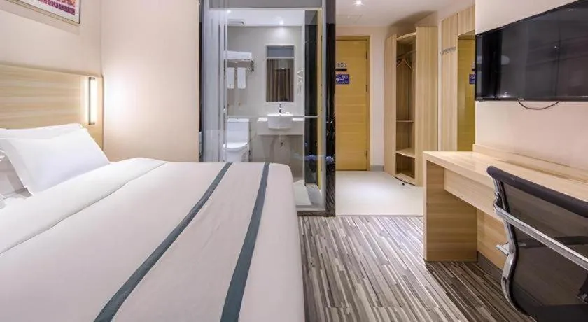 Bed in JTOUR Inn Wuzhou Arcade City Sanzongfu