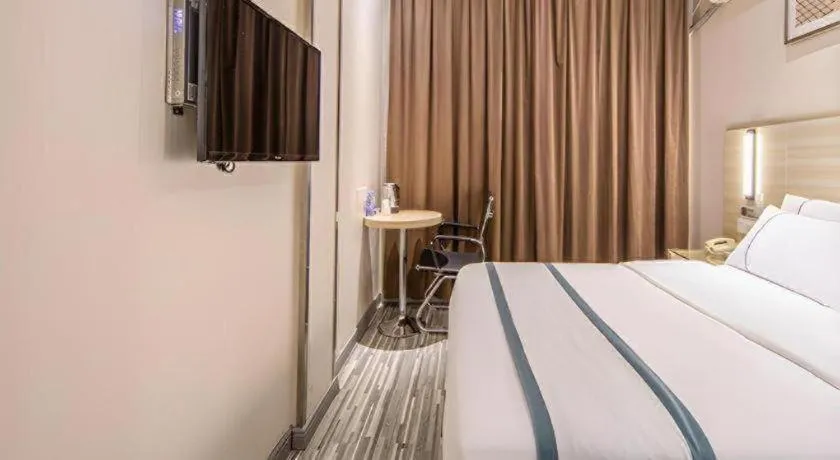 Bed in JTOUR Inn Wuzhou Arcade City Sanzongfu