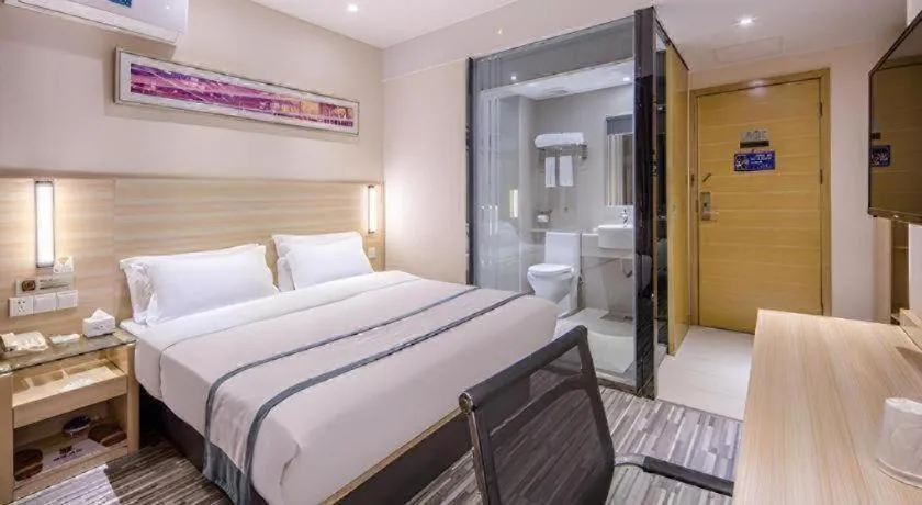Bed in JTOUR Inn Wuzhou Arcade City Sanzongfu