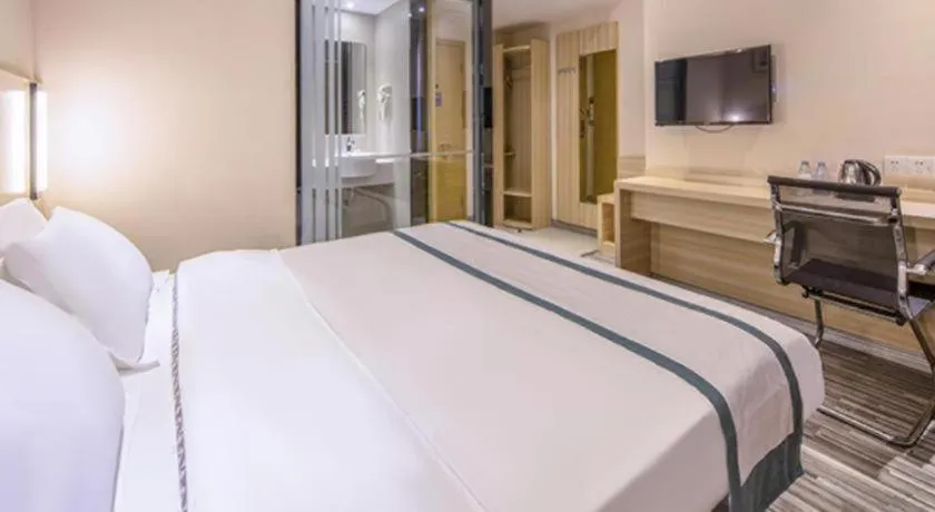 Bed in JTOUR Inn Wuzhou Arcade City Sanzongfu