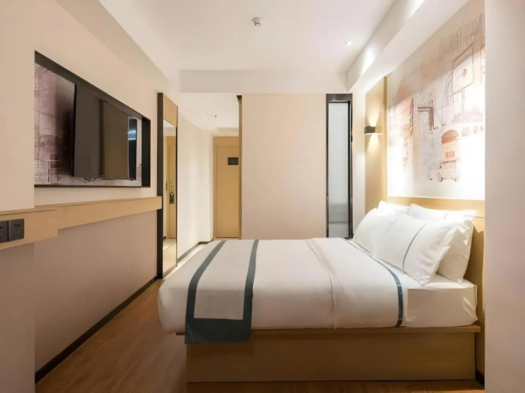 Bed in City Comfort Inn Guangzhou Liwan Zengjiao Jushu Metro Station