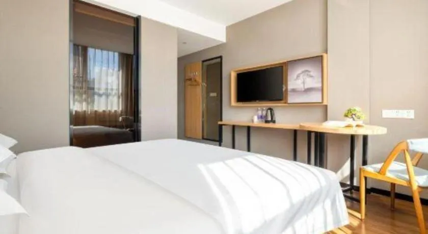 Bed in JTOUR Inn Guigang Life Port High-speed Railway Station