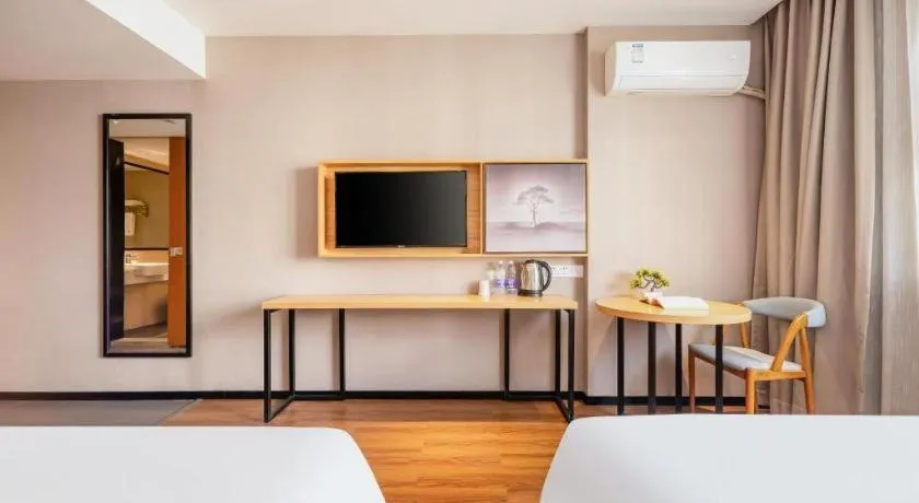 Bed in JTOUR Inn Guigang Life Port High-speed Railway Station