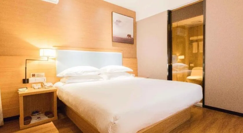 Bed in JTOUR Inn Guigang Life Port High-speed Railway Station