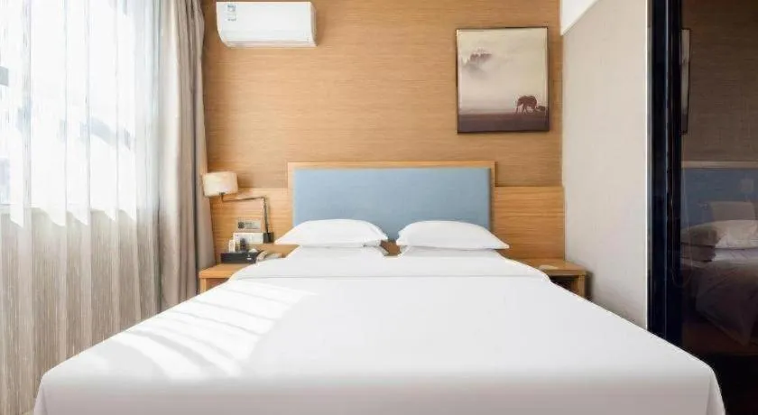 Bed in JTOUR Inn Guigang Life Port High-speed Railway Station